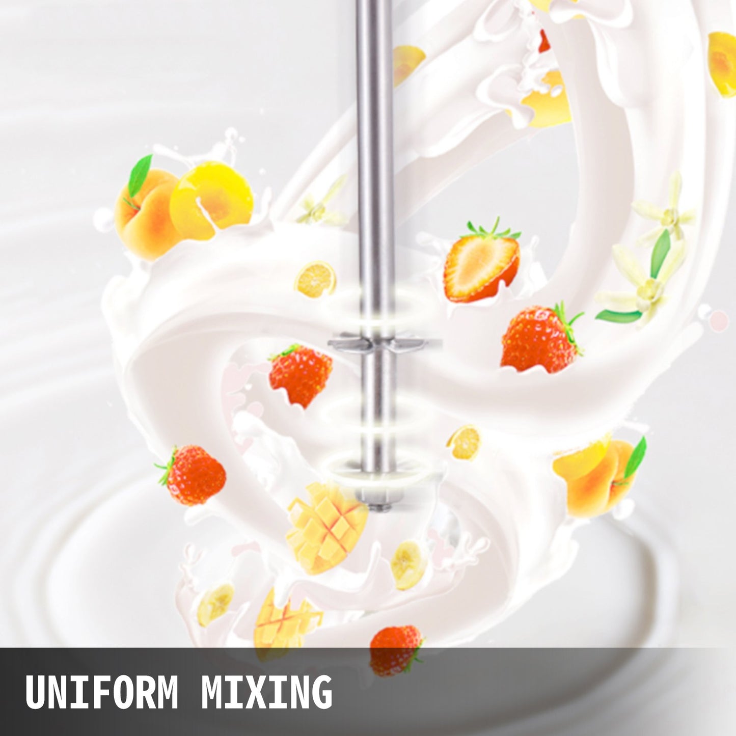 Stainless steel milkshake machine mixing milk with strawberries, peaches, mango, and bananas.