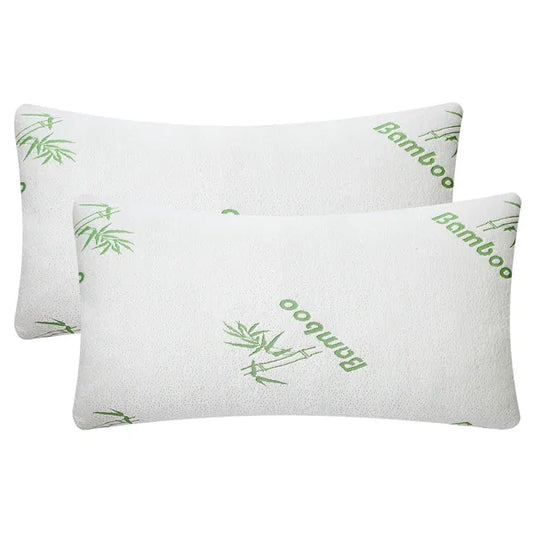 Two white queen-size bamboo memory foam pillows with green "Bamboo" text and leaf designs.