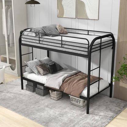 Black metal twin-over-twin bunk bed with rounded top frame, guard rails, and storage baskets underneath.