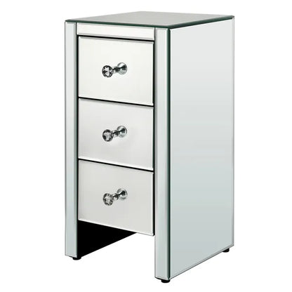 Compact mirrored end table with three storage drawers and crystal knobs.