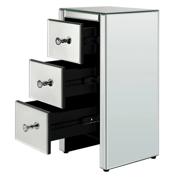 Compact mirrored end table with three open drawers and crystal knobs.