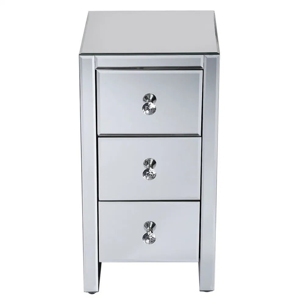 Compact mirrored end table with three drawers and crystal knobs.
