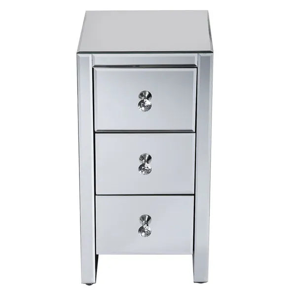 Compact mirrored end table with three drawers and crystal knobs.