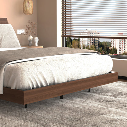 Modern walnut floating queen bed with smart LED lighting and built-in USB charging station.