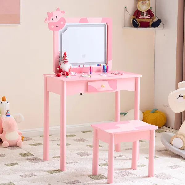Pink cow print kids dressing table with LED mirror, solid wood legs, and storage drawer, with matching stool.