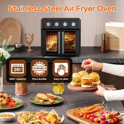 Black stainless steel air fryer oven with French doors, cooking a chicken, surrounded by various prepared foods.