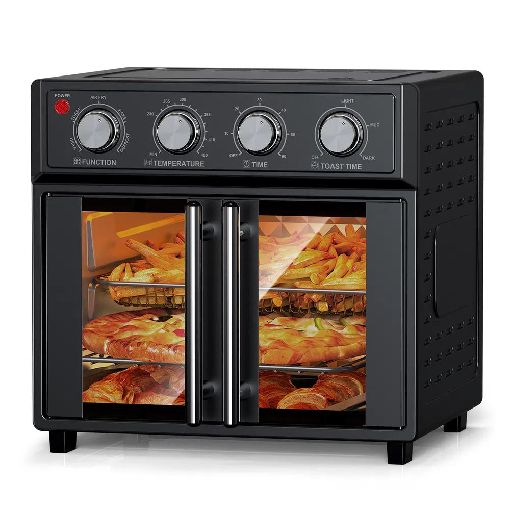 Sleek black 29.5-quart convection oven with French doors, cooking fries and pizzas on multiple racks.