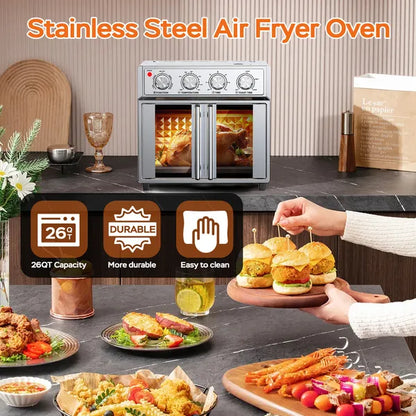 Silver stainless steel convection oven with French doors, cooking a whole chicken.