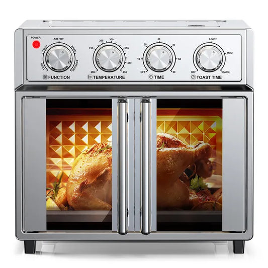 Silver 29.5-quart convection oven with French doors, roasting two golden chickens inside.