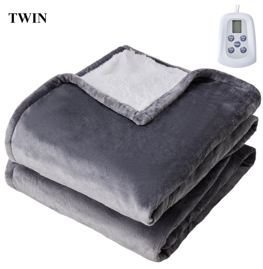 Twin size gray flannel and white Sherpa electric blanket with a digital controller.