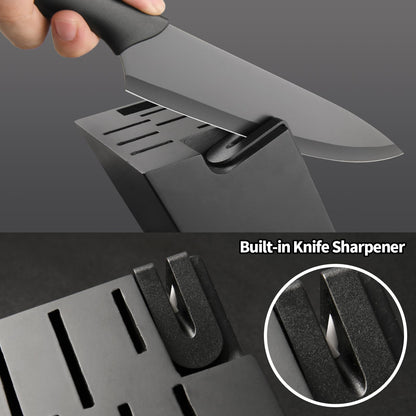 Black German steel knife being sharpened in a sleek, dark knife block with a built-in sharpener.