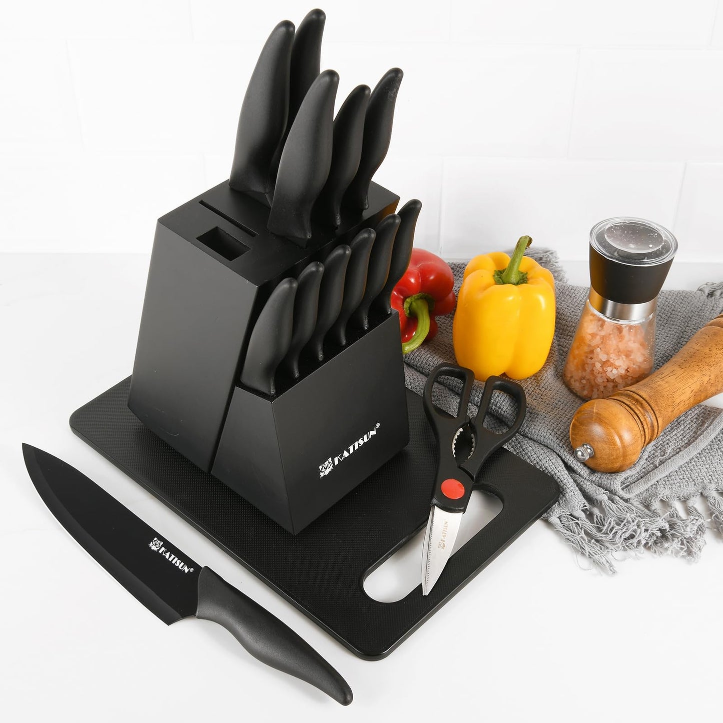 Black 16-piece German steel knife set with block, cutting board, sharpener, and kitchen shears.