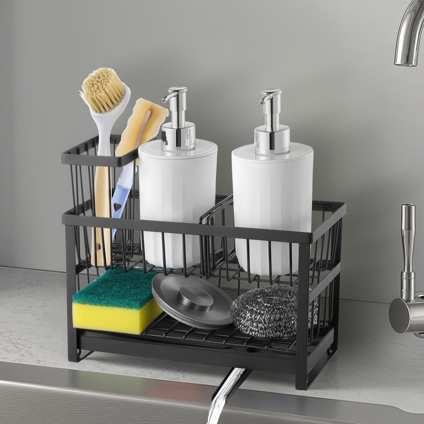 Black metal sink caddy with two white soap dispensers, sponges, and brushes.