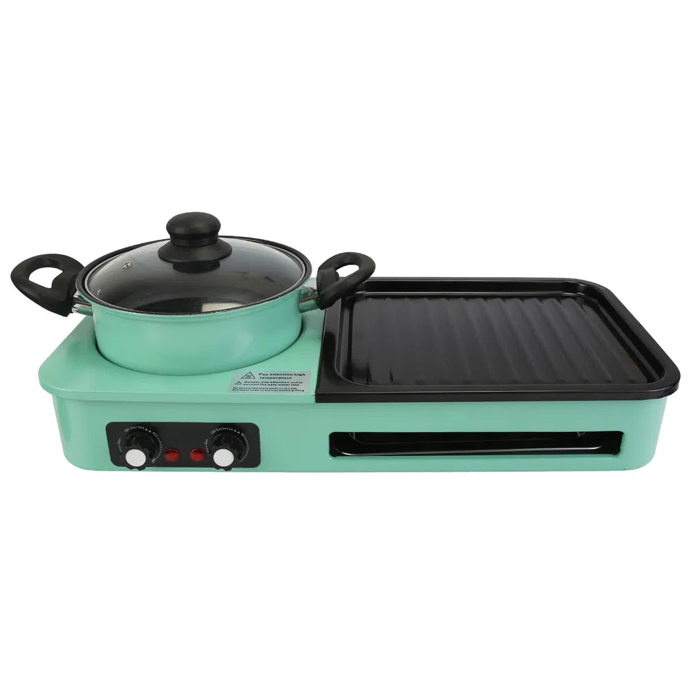 Mint green electric BBQ grill and hot pot combo with black non-stick surfaces and clear lid.