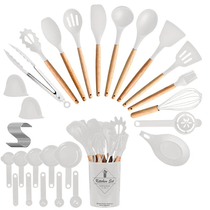 White 35-piece silicone and wood kitchen utensil set with measuring cups, spoons, and a storage bucket.
