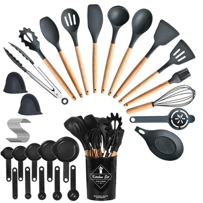 35-piece black silicone kitchen utensil set with wood handles, measuring cups, and a matching storage holder.