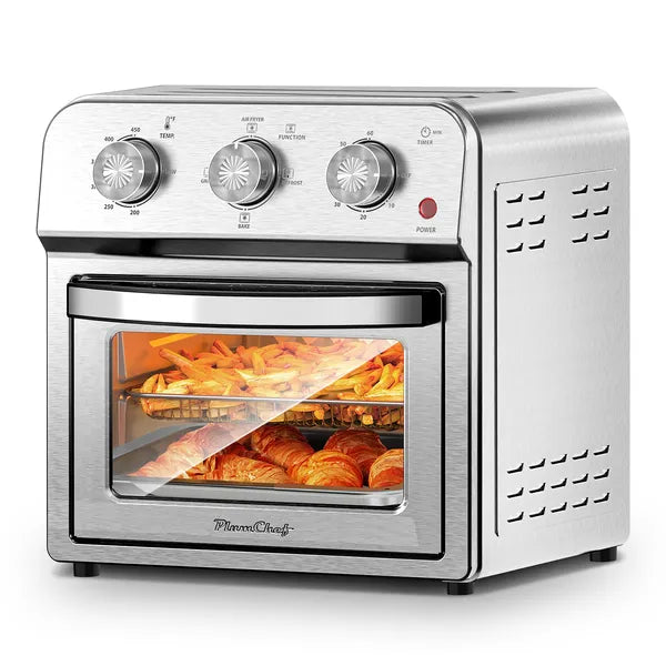 Stainless steel 13QT convection air fryer with fries and croissants visible through the glass door.